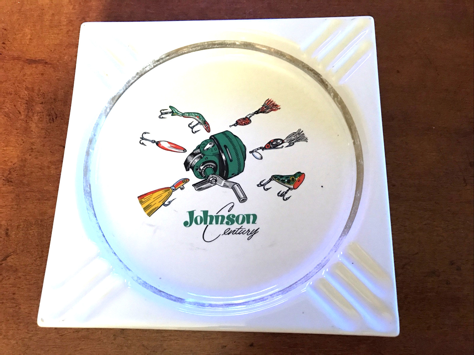 JOHNSON CENTURY FISHING LURES AND REELS VINTAGE CERAMIC ASHTRAY…RARE