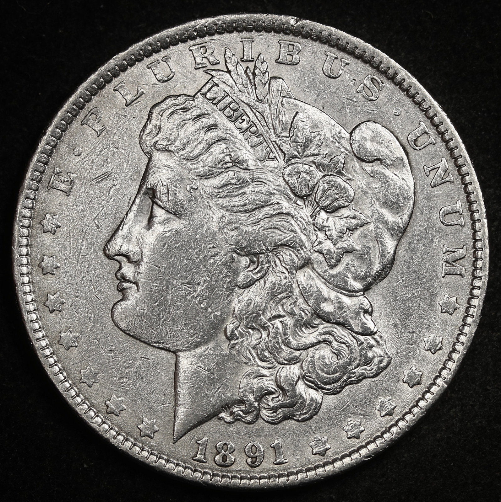 1891-p Peace Silver Dollar.  High Grade.  95077  (Inventory B)