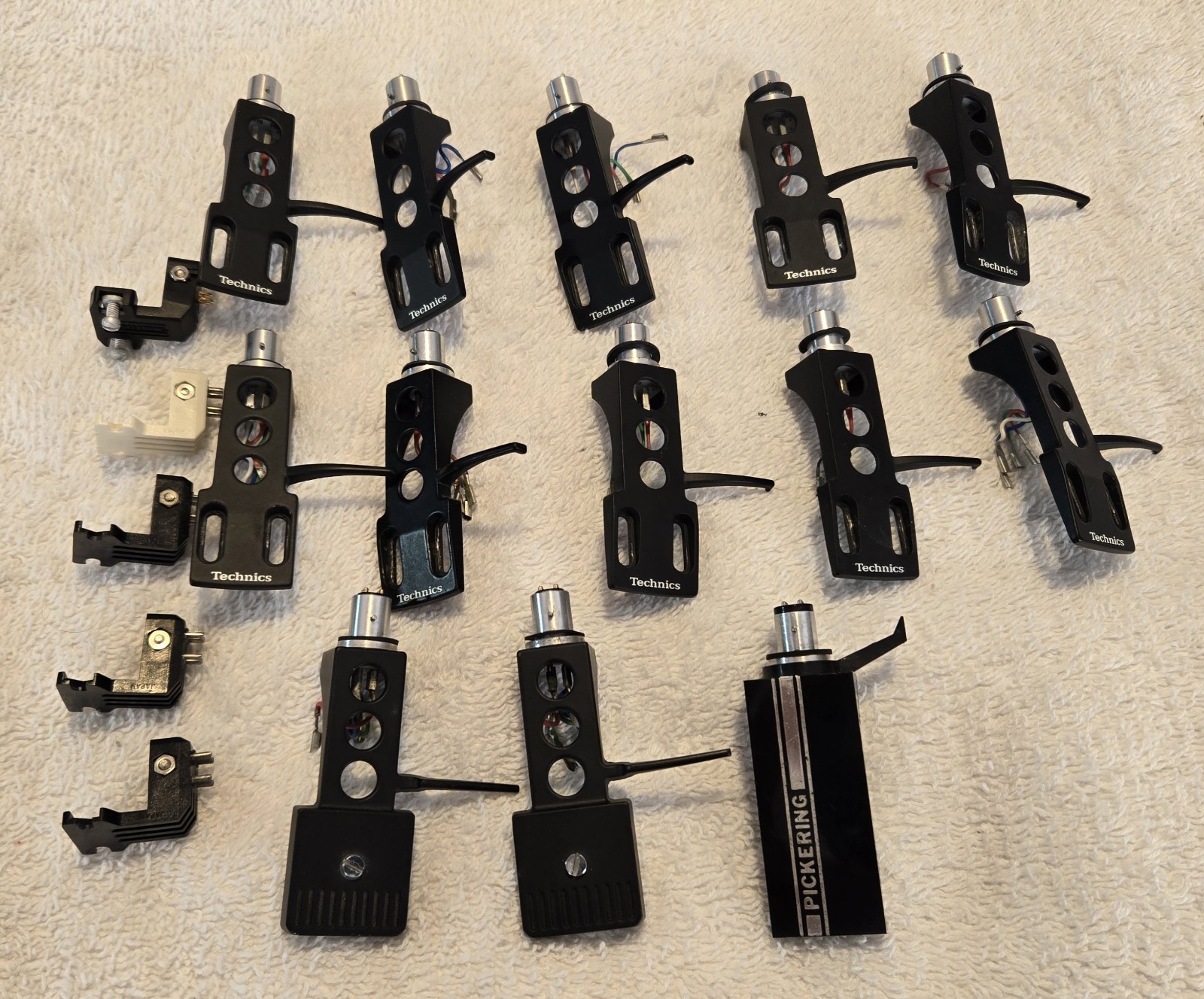 13 Turntable Headshells. 12 OEM Technics, One Pickering. Five P-Mount Adapters