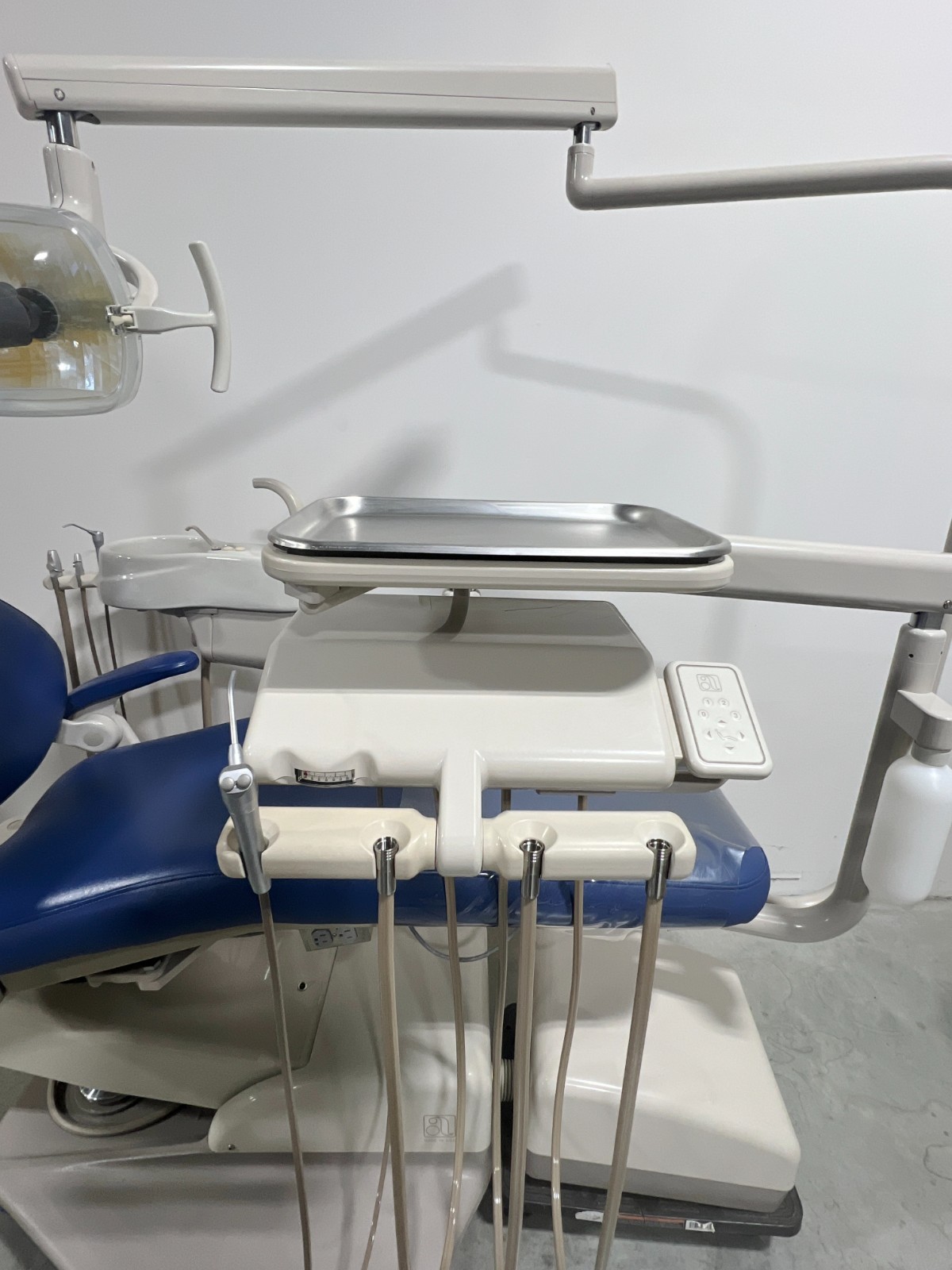 ADEC 1021 Dental Chair, Radius Delivery Unit, Cuspidor, Assistant’s Pkg & Light