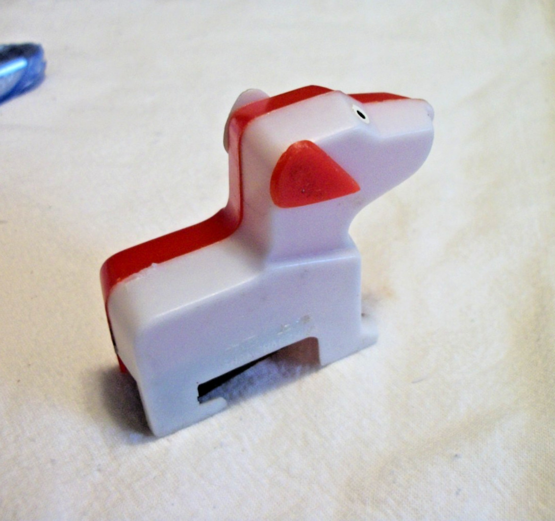 TINY FIGURAL PENCIL SHARPENER RED AND WHITE DOG