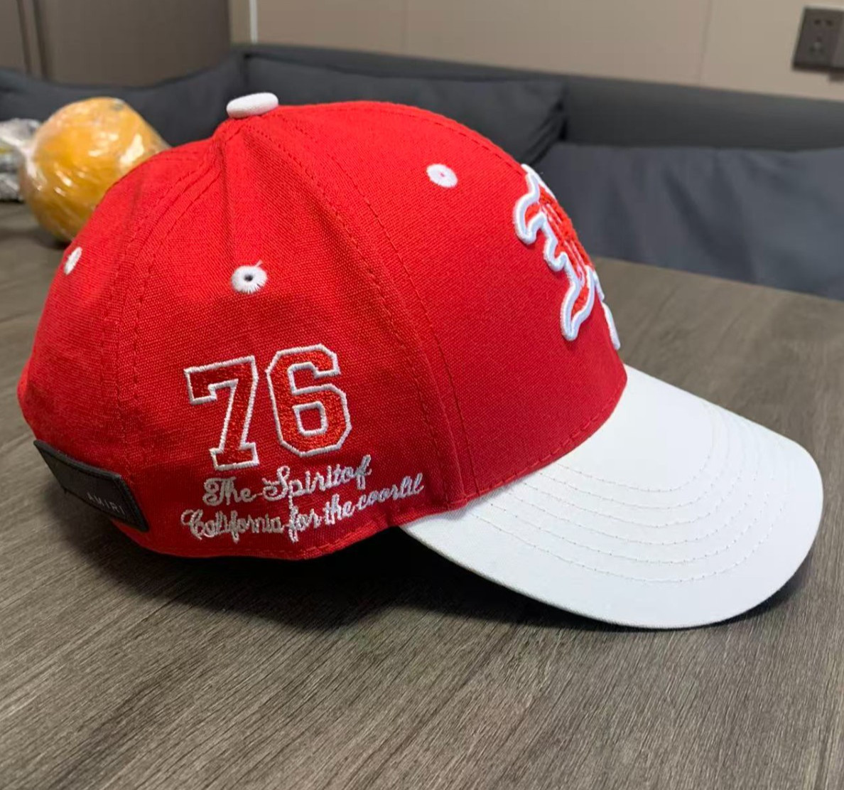 AMIRI Men's and Women's Red Baseball Hat Sports Hat Truck Driver Hat Sun Hat