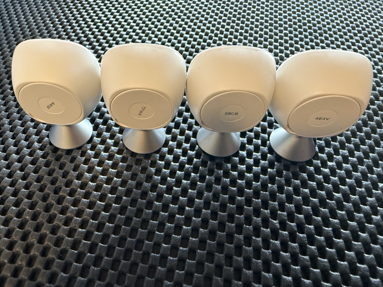 Ecobee SmartSensor Room Temperature Sensors, White, with a stand.