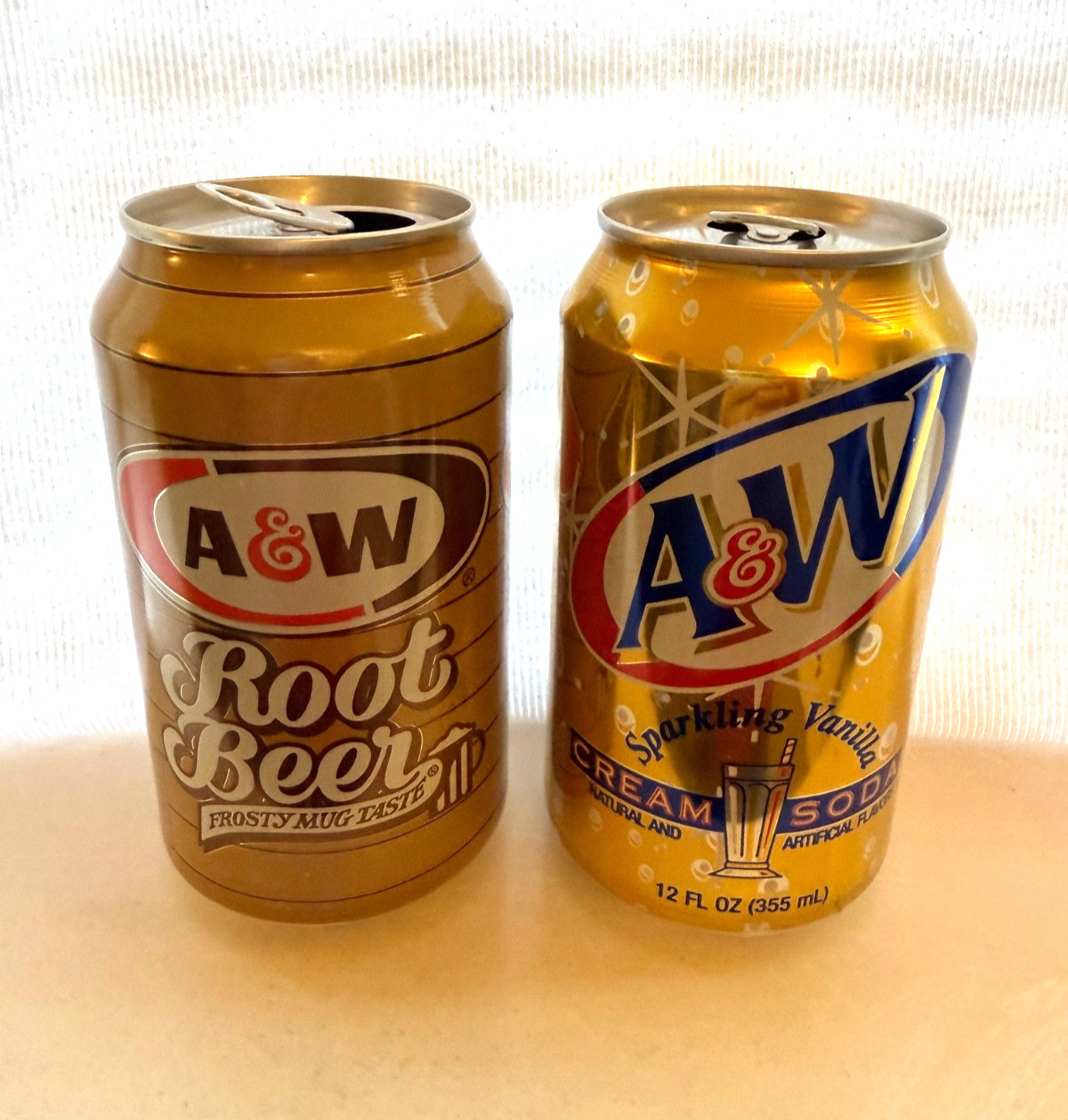 Four A&W Root Beer cans from the 1990's 12oz each
