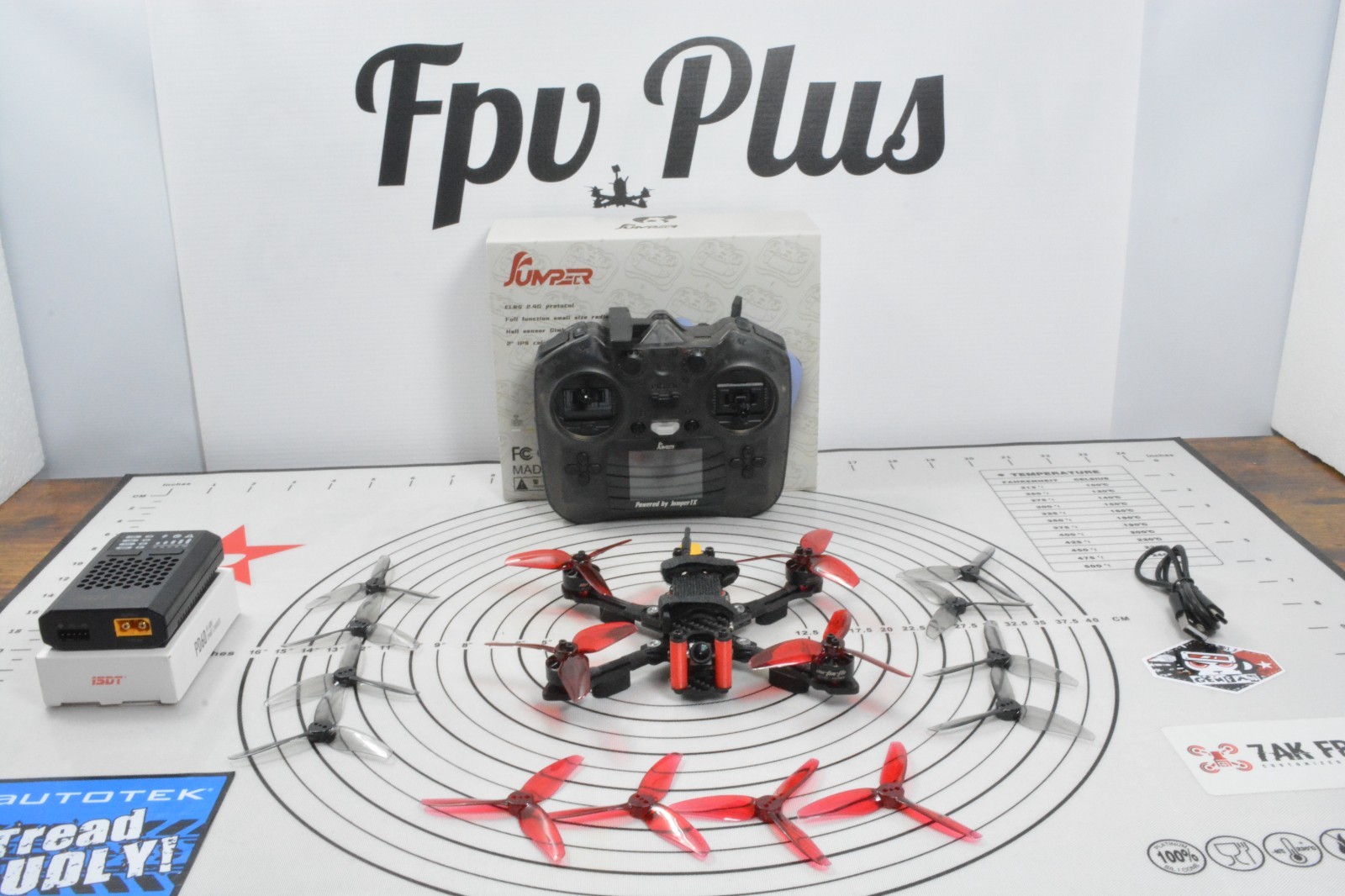 3 inch FPv drone RTF with remote, batteries and charger.