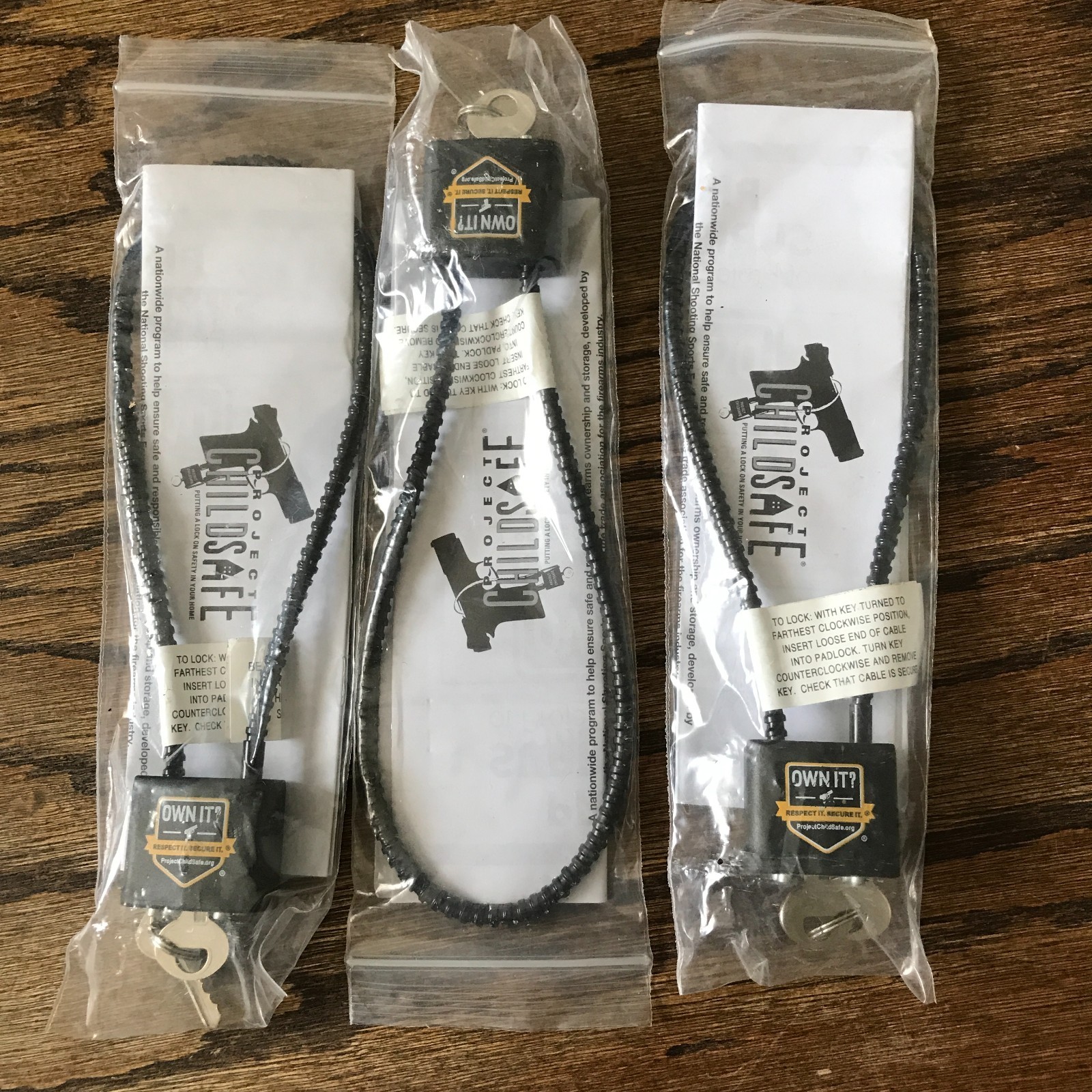 Lot of 3 Project ChildSafe Gun Cable Locks Own It Shield Logo Brand New with Key