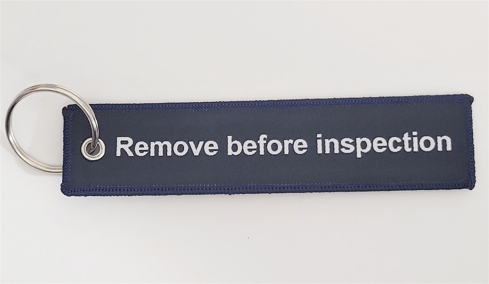 Dolphitech / Remove Before Inspection Blue Flight Tag Keychain Military