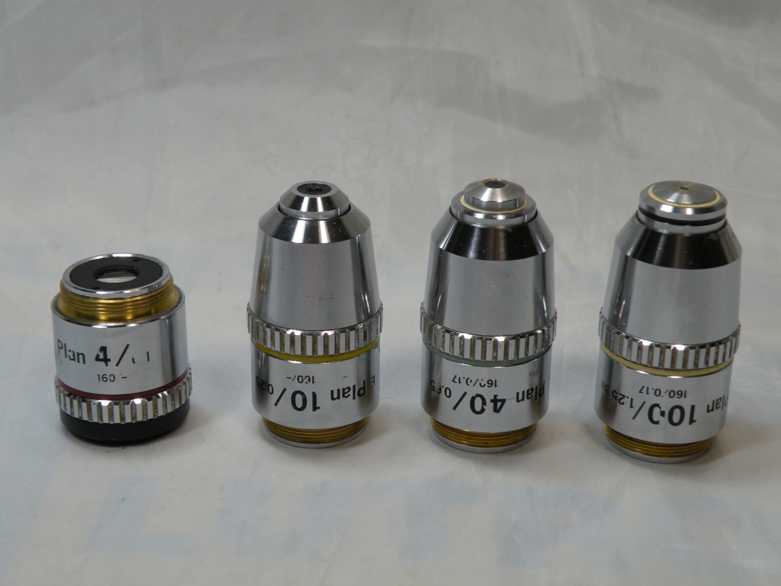 Nikon E-Plan Objectives:- 4X, 10X, 40X, 10OX Oil, Good Condition
