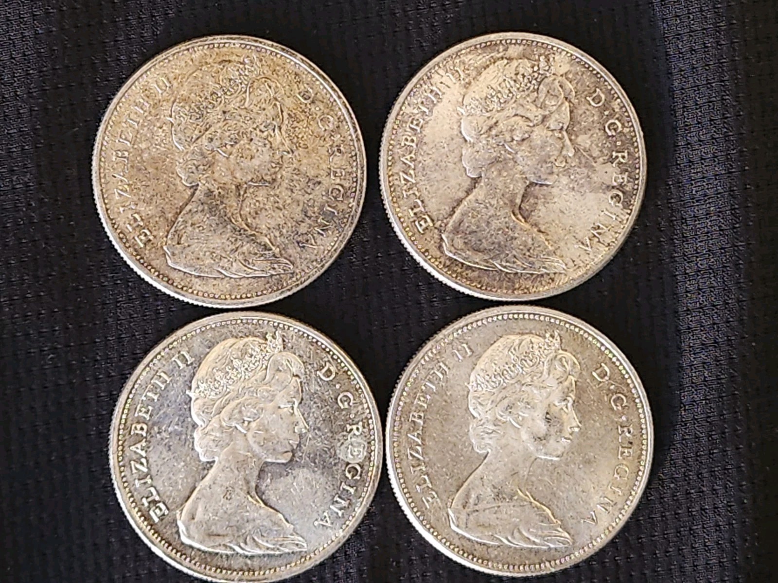 Lot of 4 Canadian Silver Dollars
