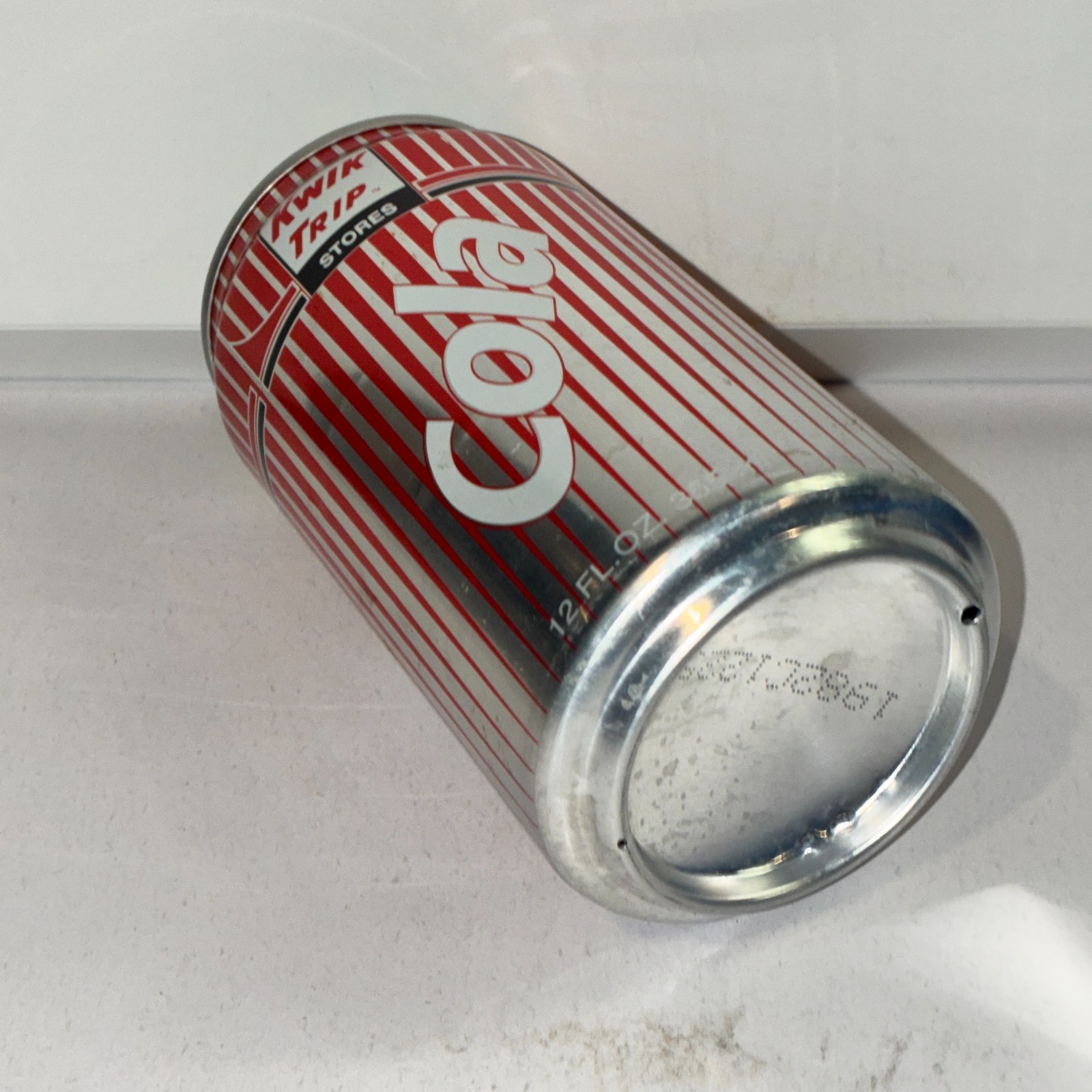 Kwik Trip Cola Soda can, bottom opened