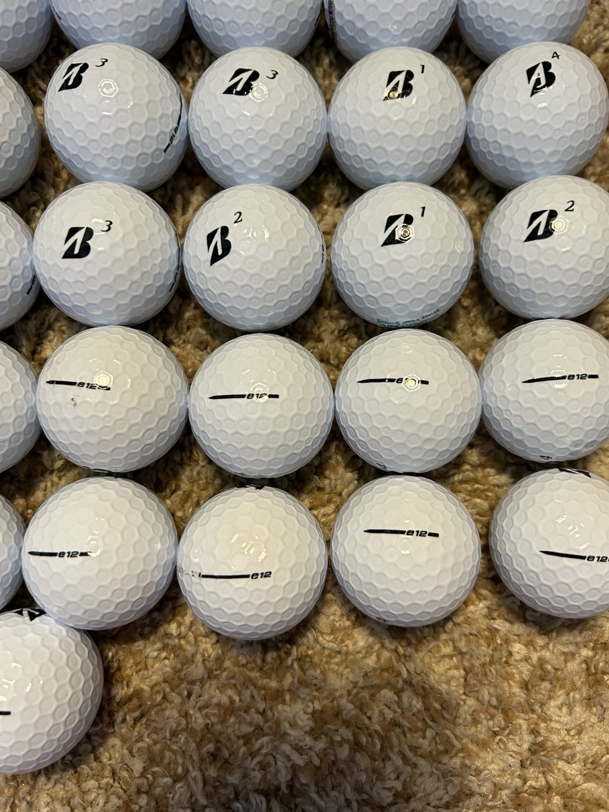 50 Mint Bridgestone E12 Golf balls