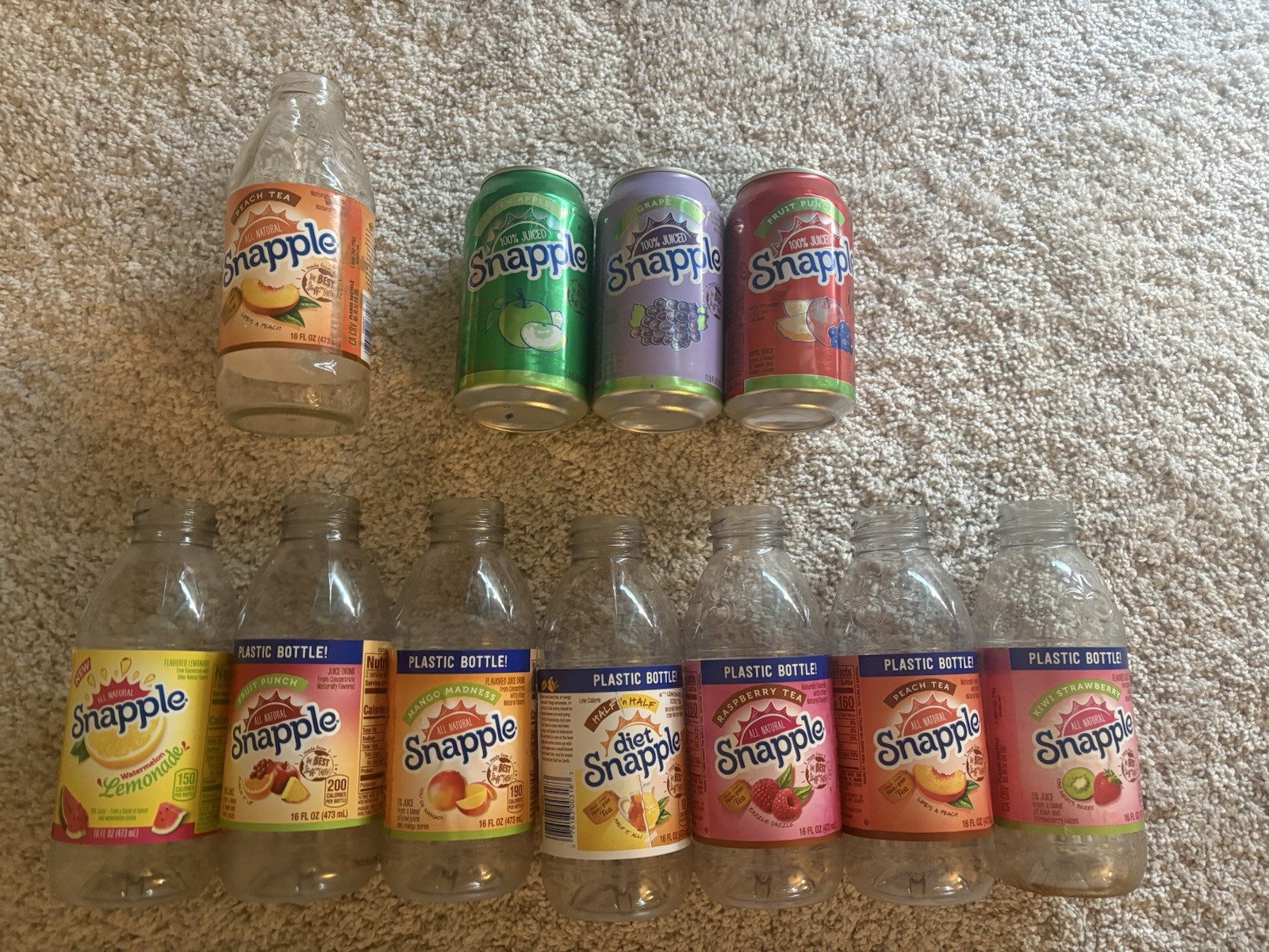 Lot of Opened Snapple Bottles Including Rare Cans