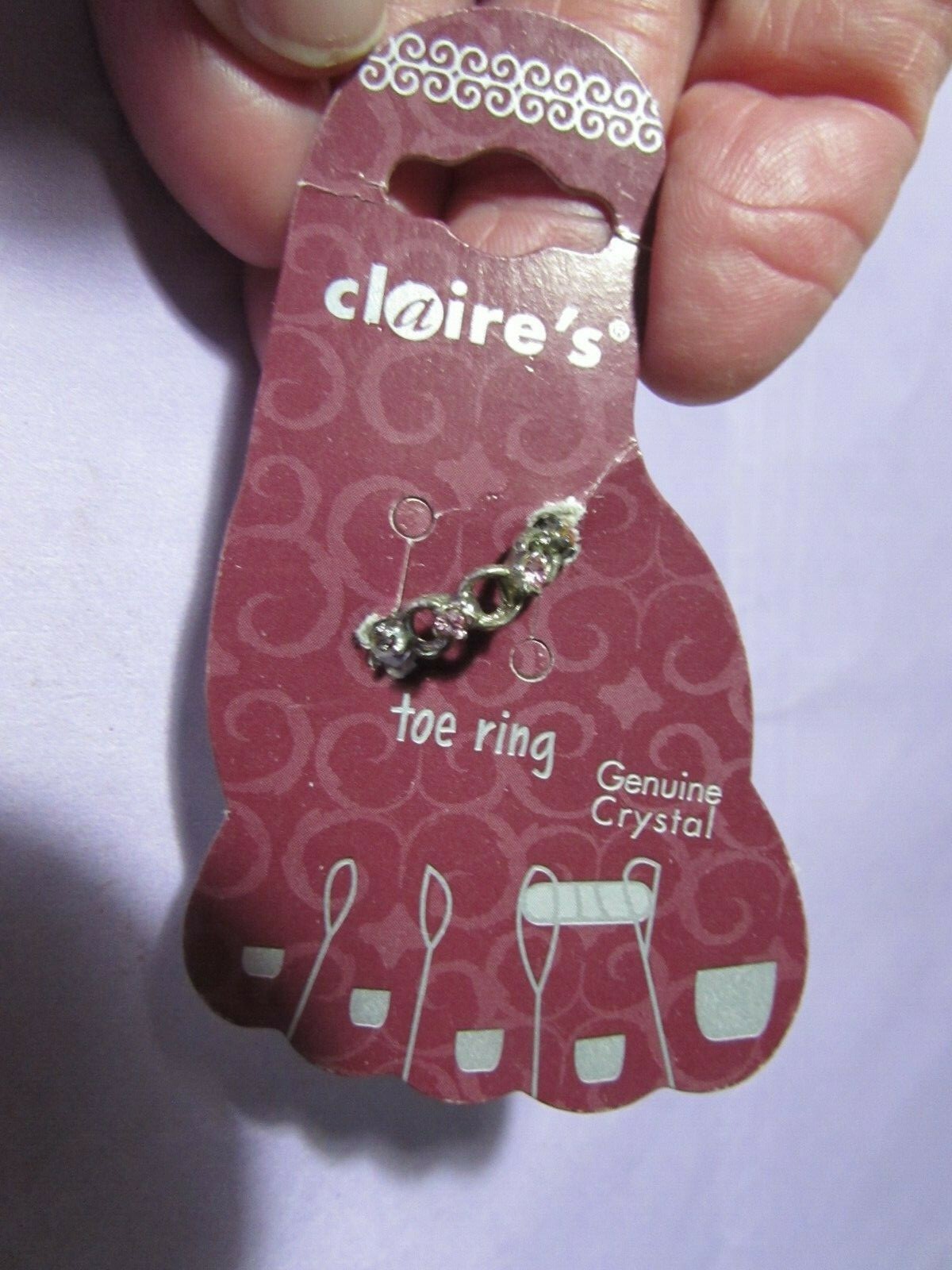 CLAIRE's BOUTIQUE silvertone toe ring with pink crystal stones