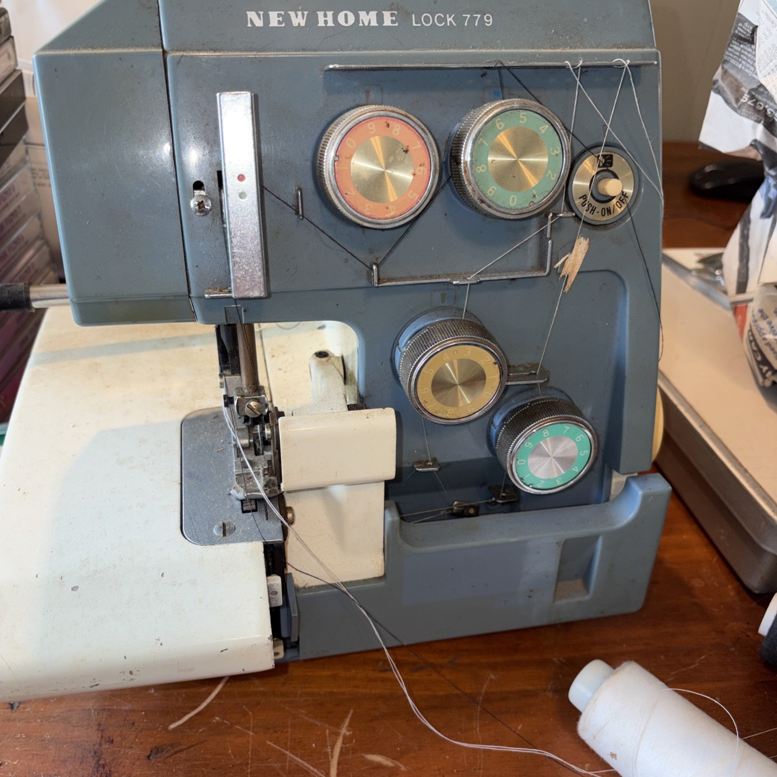 New Home Lock 779 serger sewing machine is 10" x 11" x 12"; B