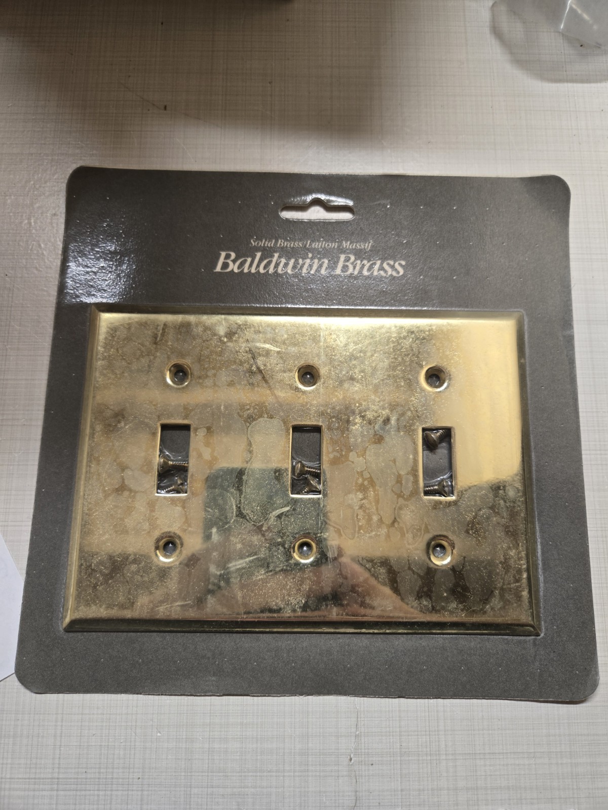 Baldwin 4770-030 Triple Switch in Polished Brass