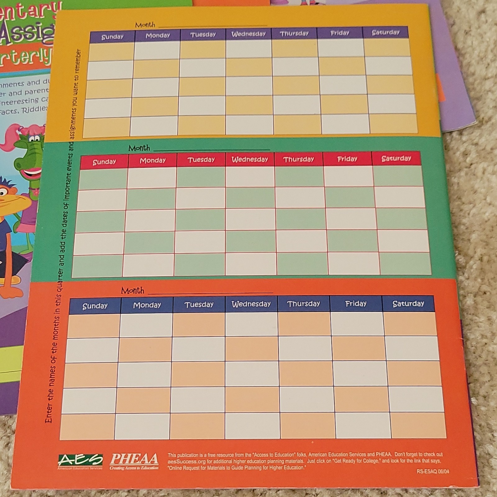 Five AES PHEAA Quarterly Assignment books, One My Student Planner Elementary
