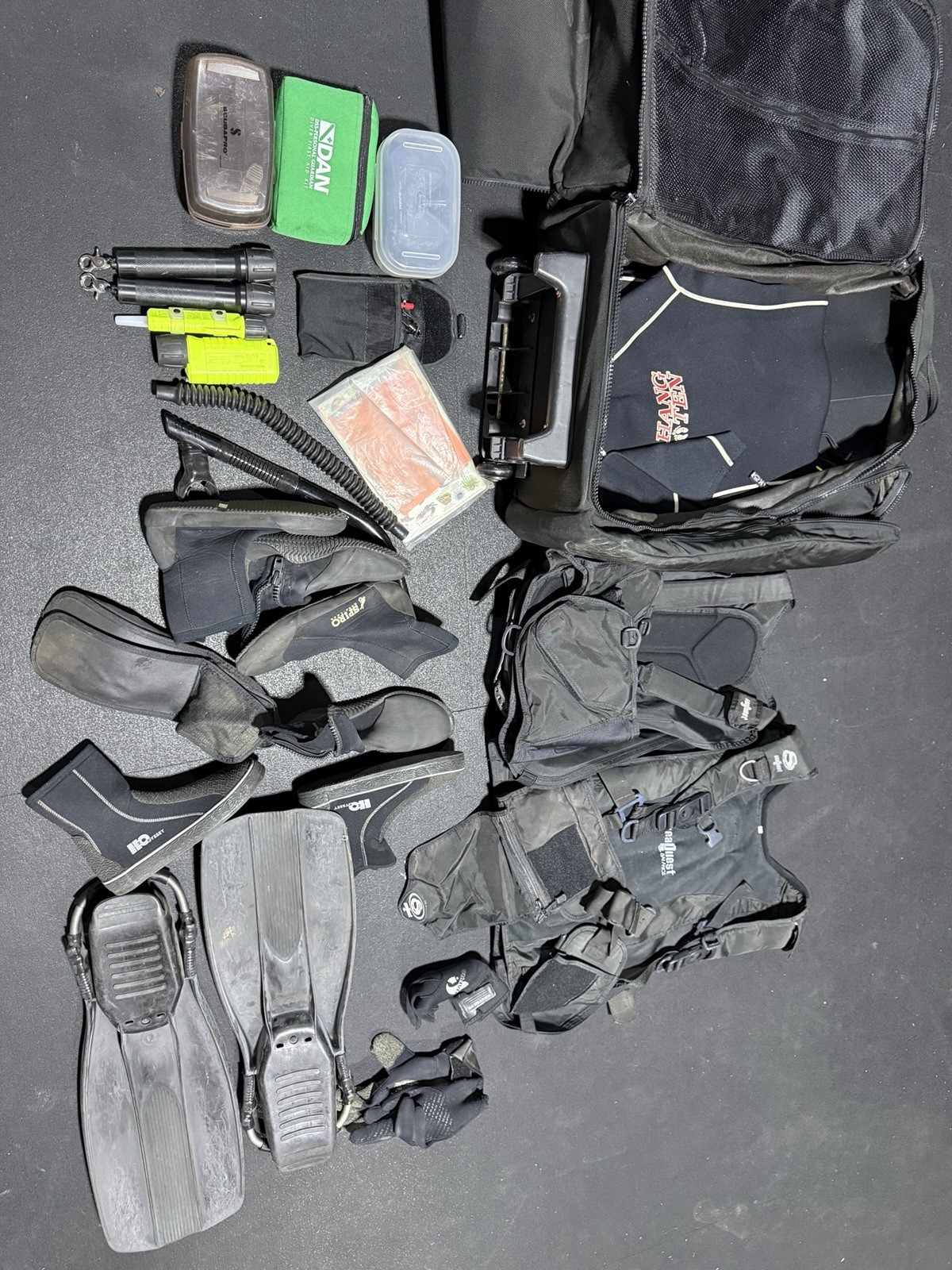 huge scuba gear lot fins, boots gloves  westsuits flash lights seaquest vests