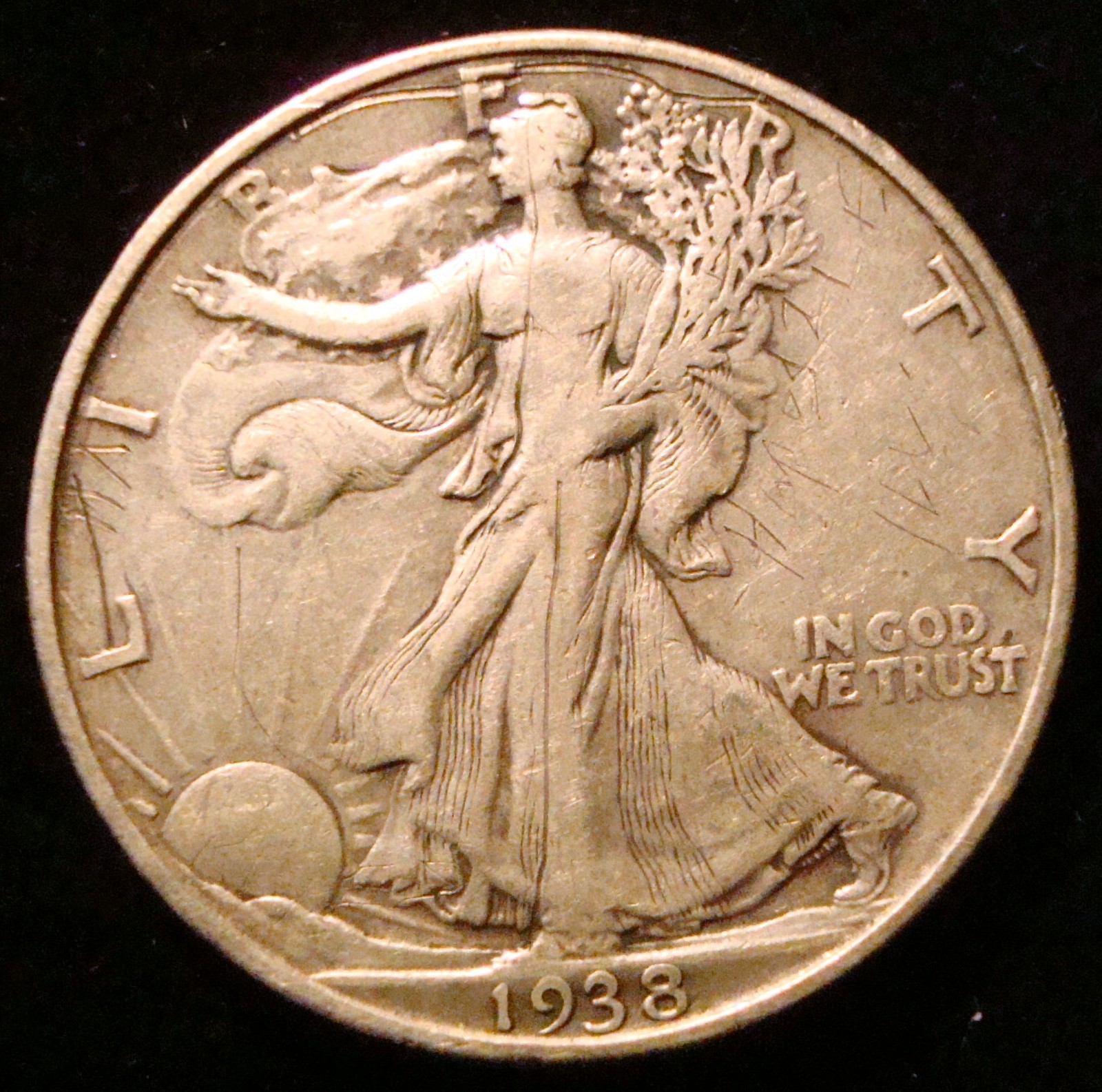1938-D  Walking Liberty Half dollar Graffiti hole filler