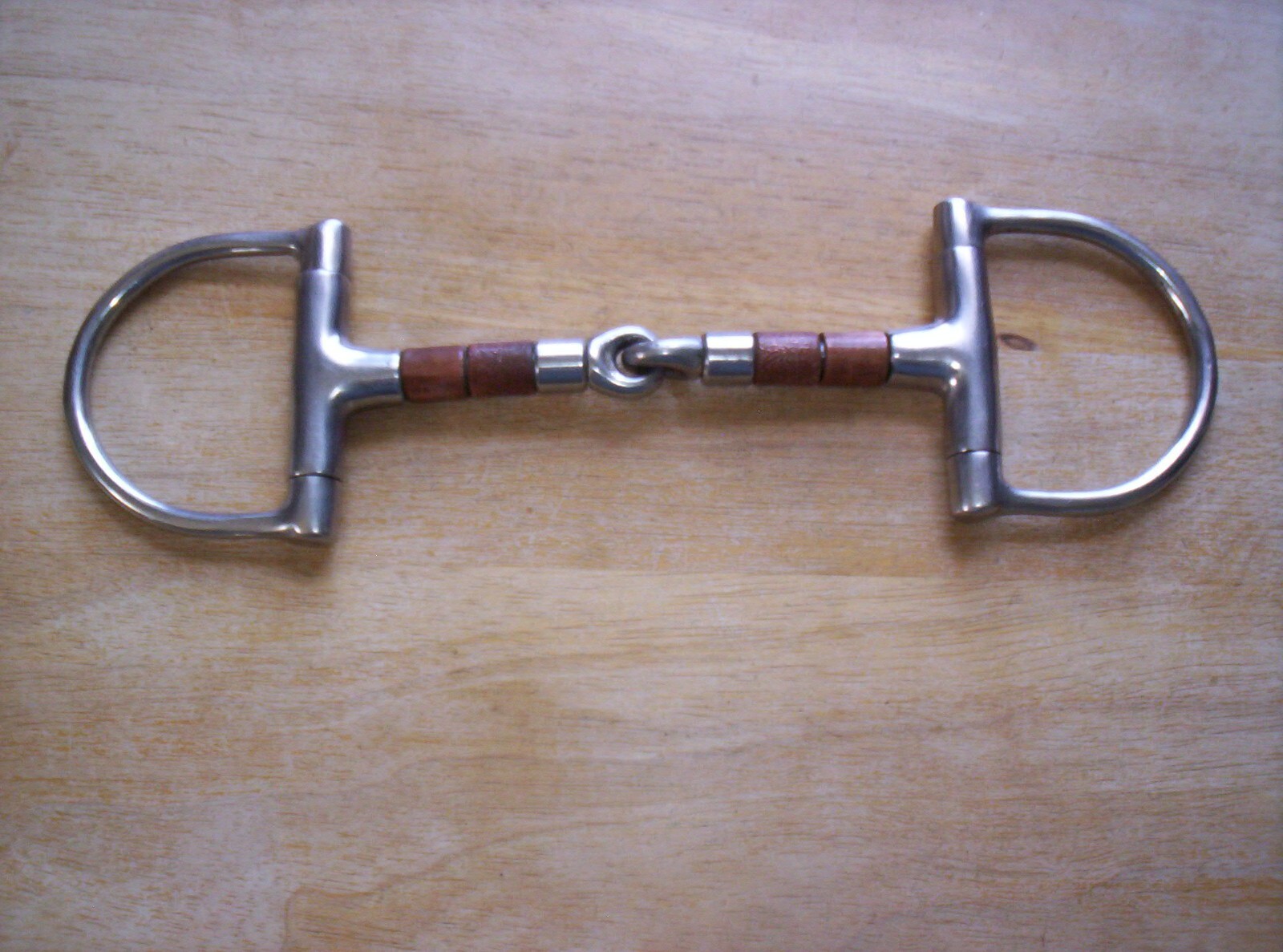 Used Korsteel  SS Dee Ring Snaffle Bit 5 1/4"  Mouth w/ Copper & SS Rollers