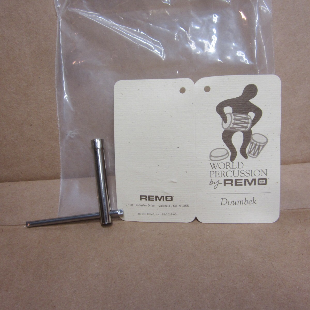 REMO hang tag and adjustment wrench (key) for Doumbek