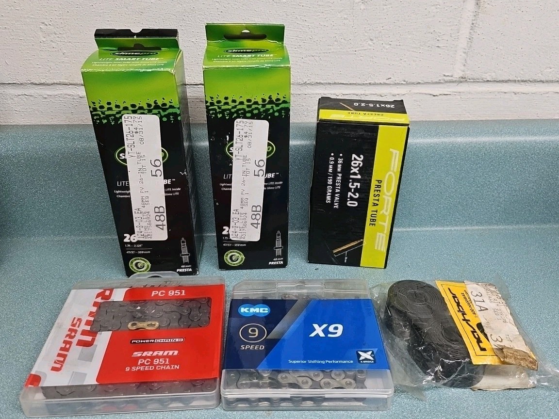 SRAM PC-951 and KMC X9 CHAINS,NASHBAR RIM STRIP 26" x 23mm, 26" TUBES ASST. LOT