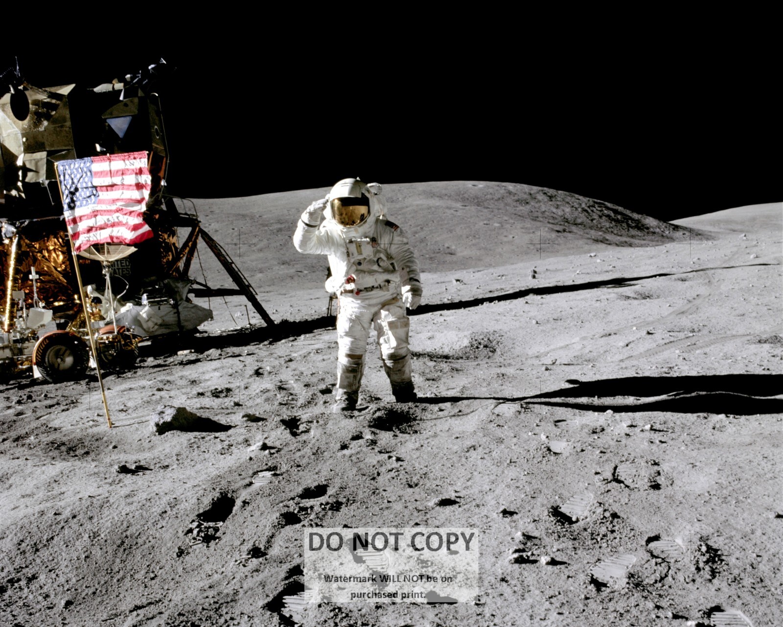 ASTRONAUT CHARLES DUKE SALUTES FLAG DURING APOLLO 16 - 8X10 NASA PHOTO (SP-108)