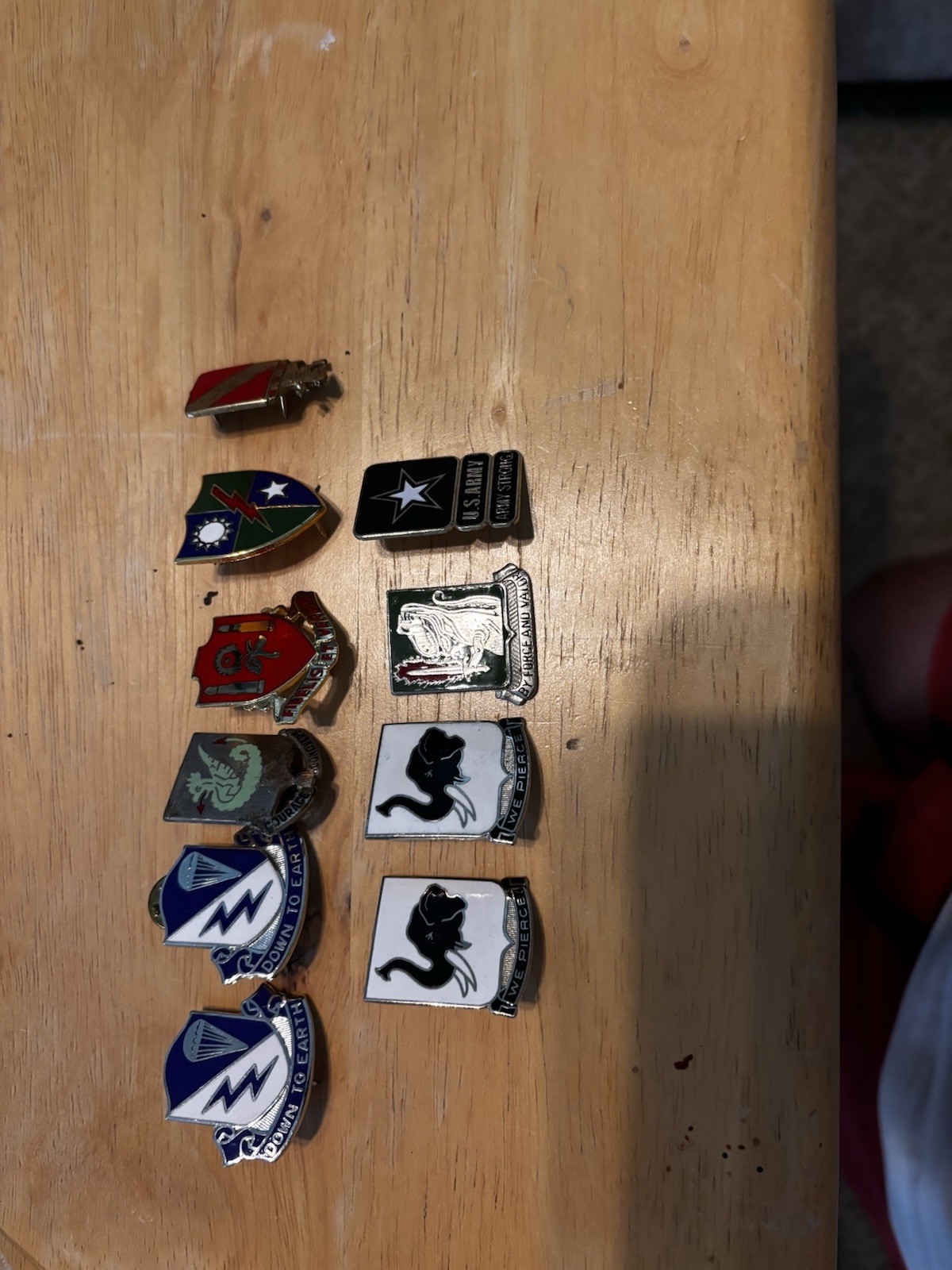 U.S. Army unit insignia DUI pins World War II-era badges. They are collectible,