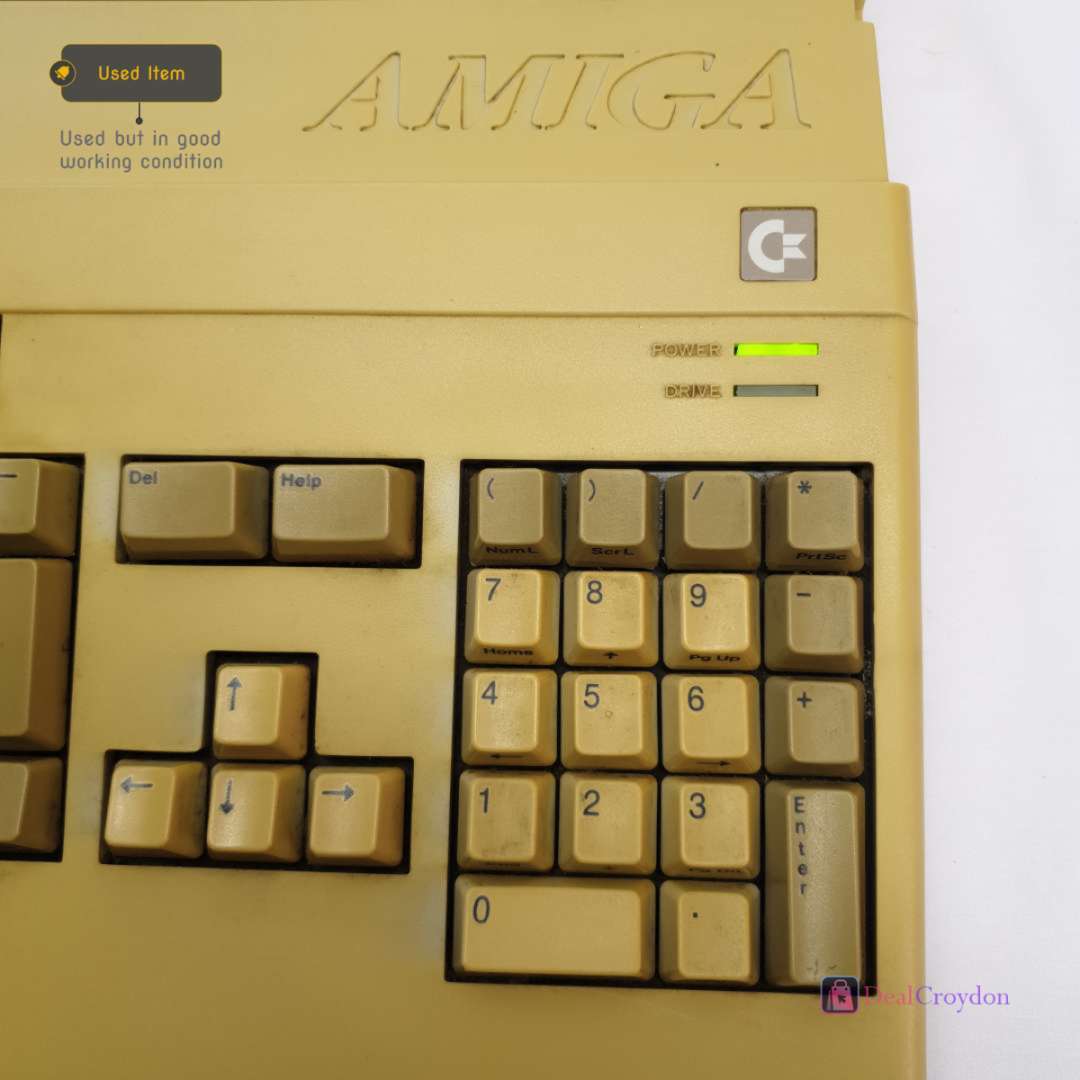 COMMODORE AMIGA A500 COMPUTER +COMMODORE A520 +MOUSE + 10 DISKS + POWER SUPPLY