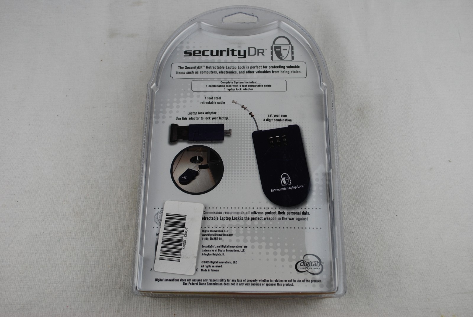 SECURITY DR. RETRACTABLE LAPTOP LOCK, NEW, SEALED Clamshell Packaging