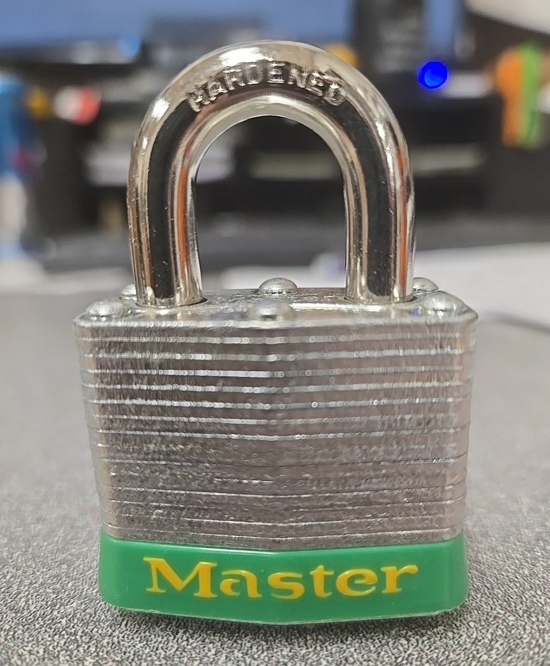 MASTER LOCK COMMERCIAL STEEL PADLOCK W/ GREEN BUMPER (3GRN) *NEW IN FACTORY BOX*