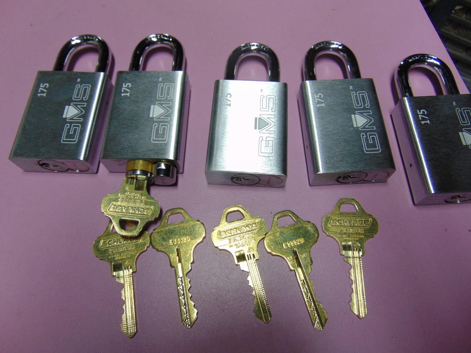 5 NEW GMS PADLOCK WITH SCHLAGE PRIM AND  5 C135 PRIM KEYS  1 CORE    LOCKSMITH