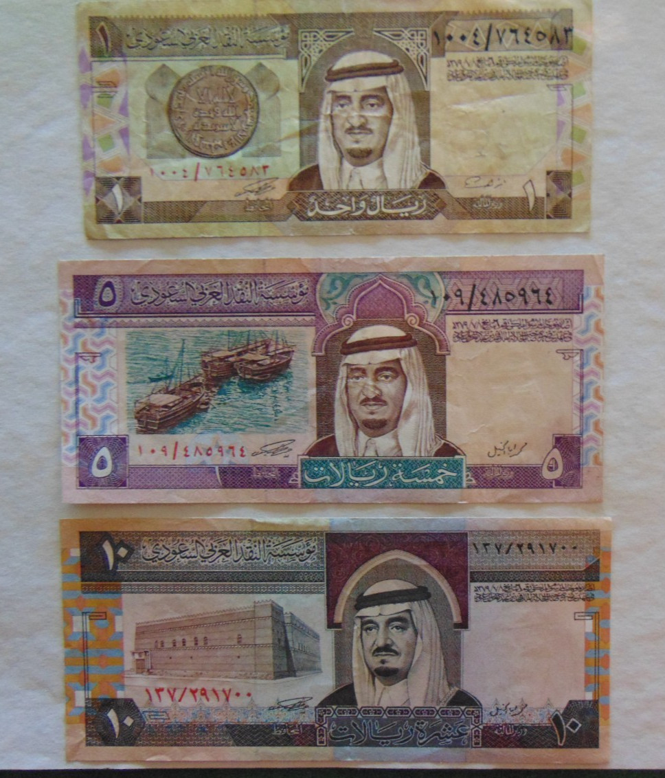 26.04 #88: SAUDI ARABIA (lot of 3) 1,5,10 Riyals P-21,22,24 VF -XF