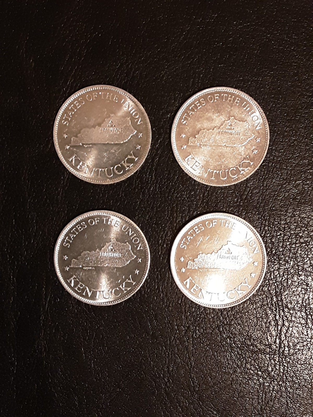 Kentucky Shell's coin game / Lot of 4