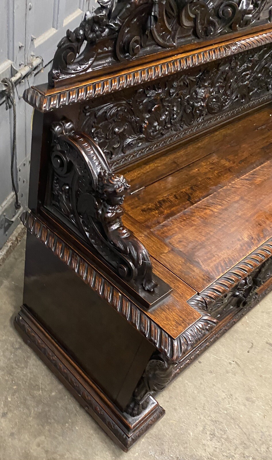 CARVED FIGURAL WALNUT BENCH