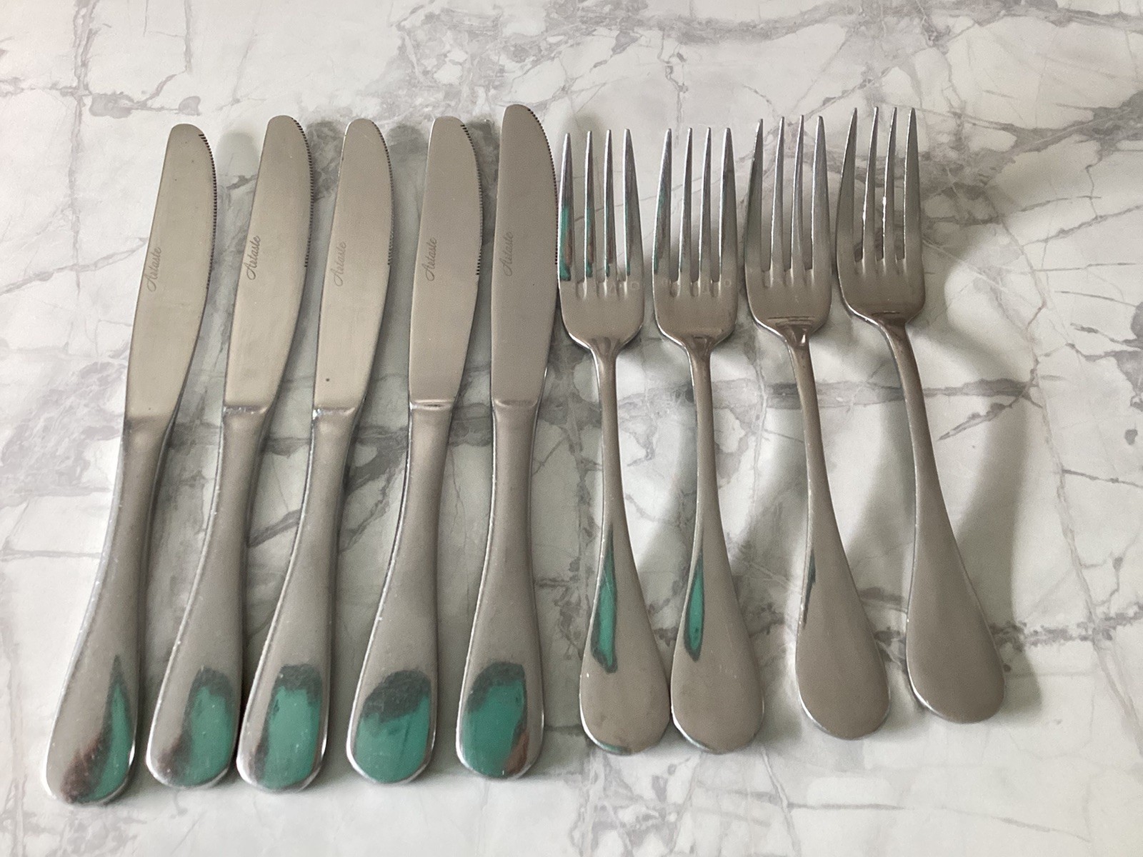 9 PC. ARTASTE STAINLESS FLATWARE.