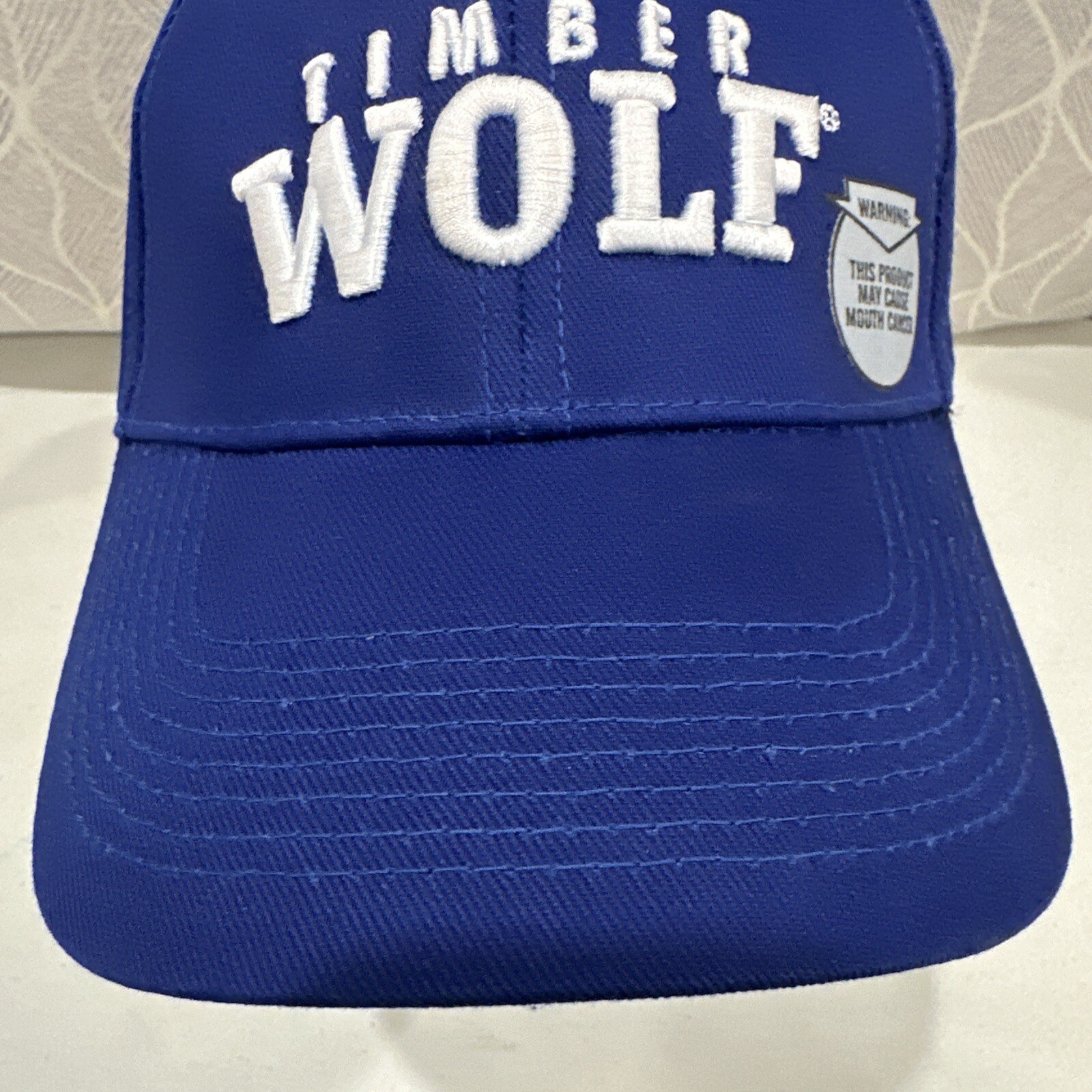 Timber Wolf Hat Cap Royal Blue with White Letters Cancer Warning Tag Hook Loop