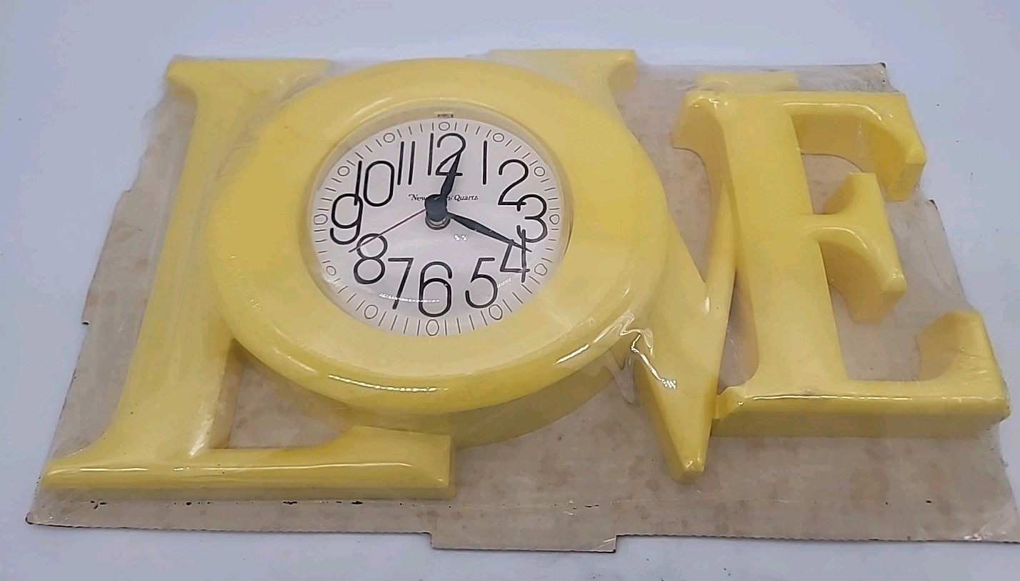 Sealed Vintage Love Yellow Plastic Wall Clock 8x16in Hippie Retro Made In USA