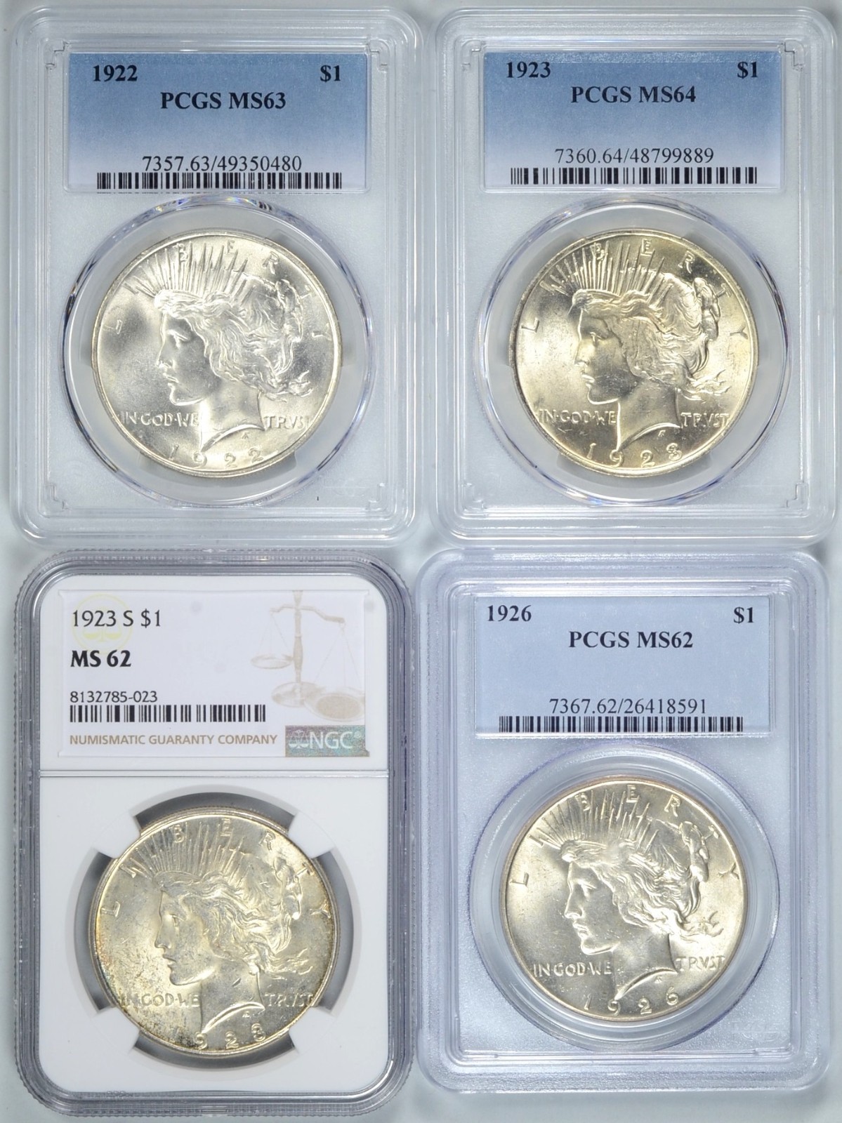 4 Coin Peace Dollar lot graded By PCGS and NGC