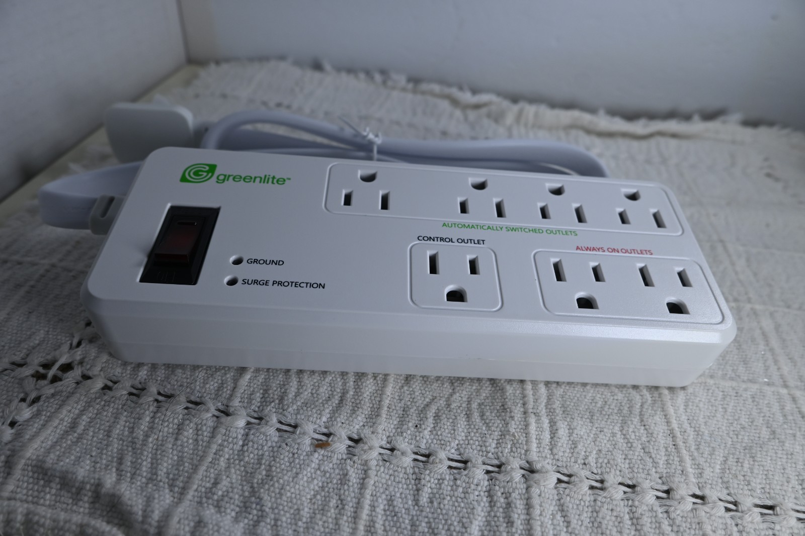 Greenlite Tier 1 advanced power strip 7 outlets sealed with instructions