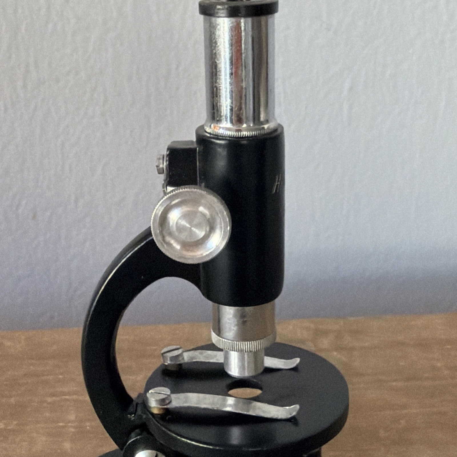 Vintage HIKA 150x Microscope 5in. Includes 3 slides and original box.