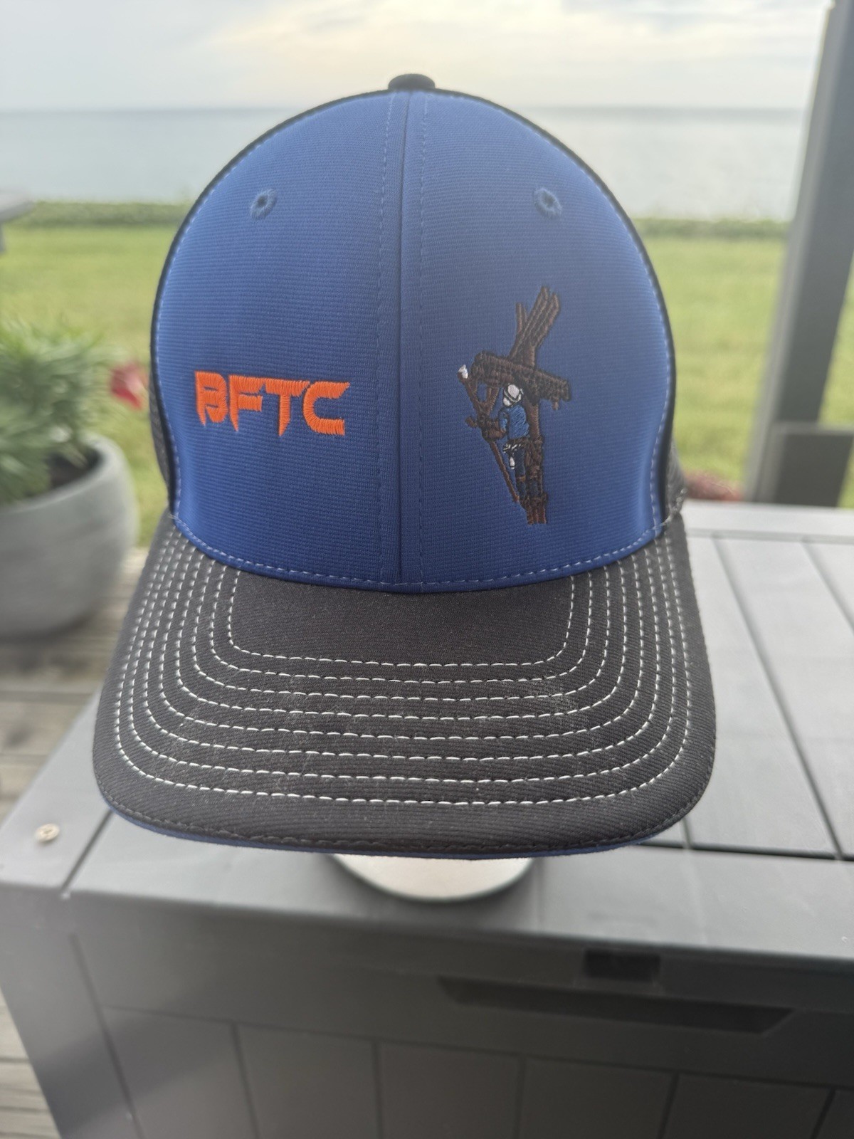 BFTC Fluorescent  Letters w Man on Electric Pole Hat Cap Royal Blue Black S/M