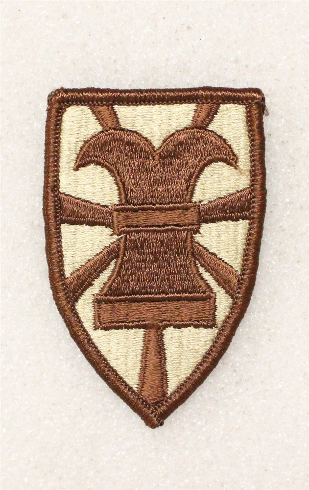 Army Patch: 7th Transportation Command - tan w/merrowed edge