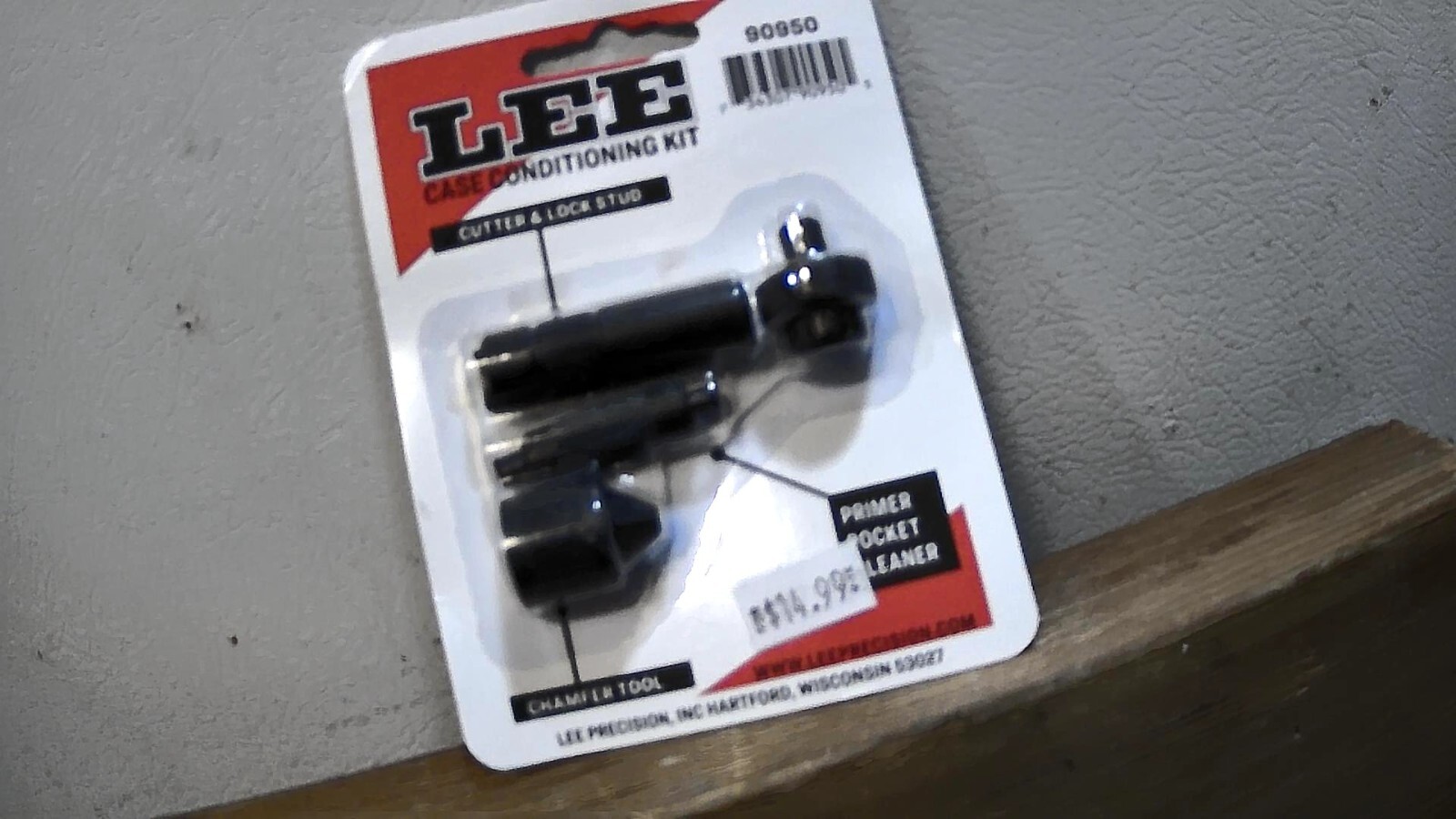 Lee cutter and lock stud, primer pocket cleaner, and a chamfer tool.