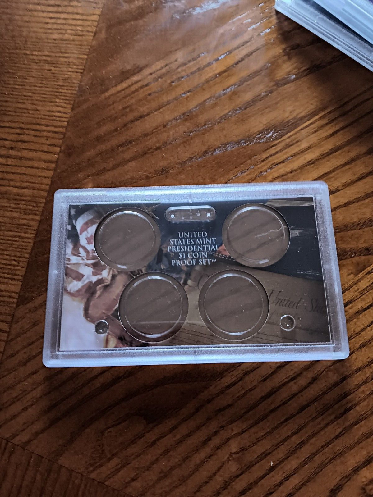 US Mint proof 4 hole Pres. dollar lense.No coins,box or coa,used.