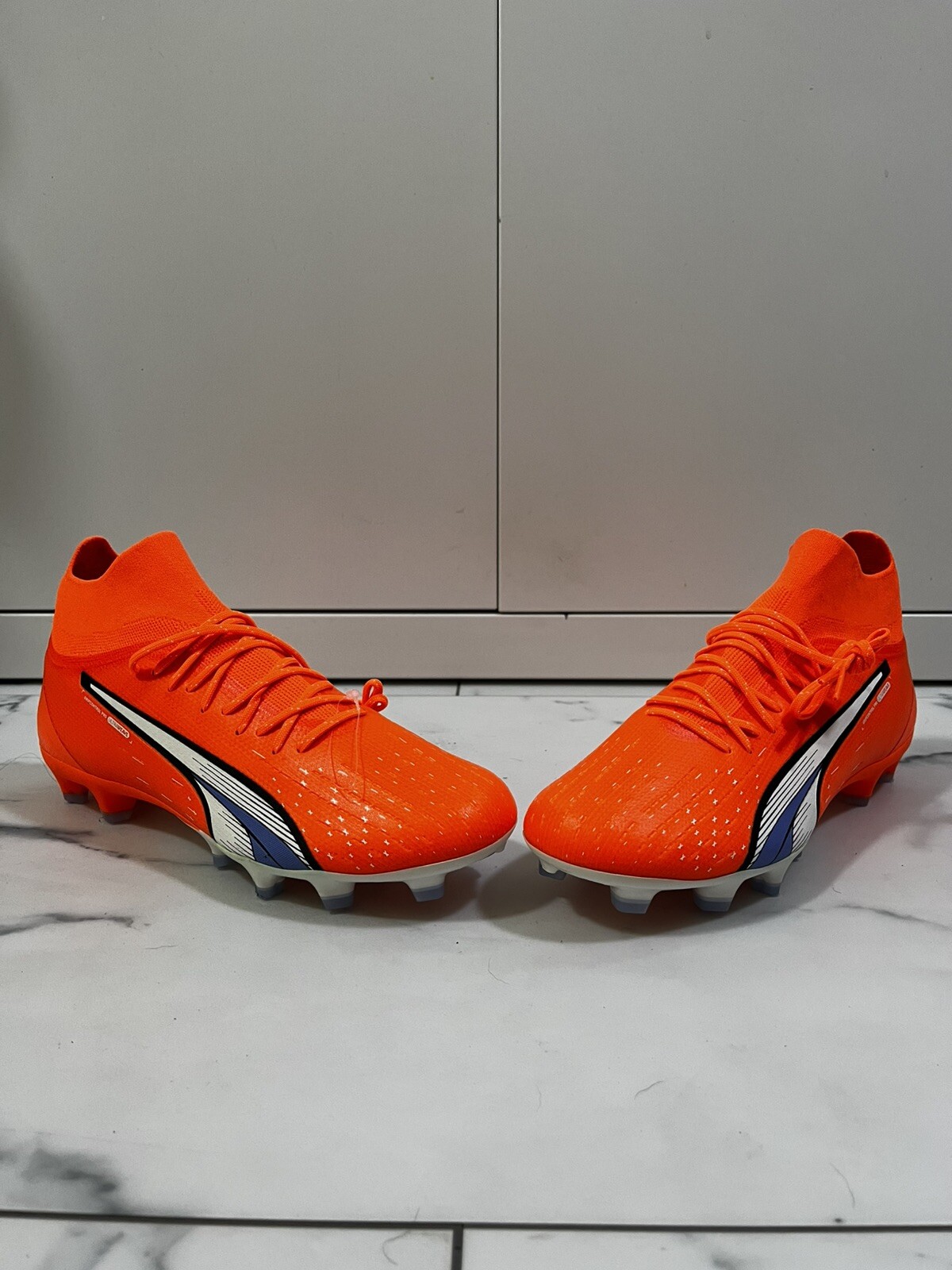 Puma Ultra Pro FG/AG M 107240 01 football shoes orange  and reds Size 10/8.5/9.5