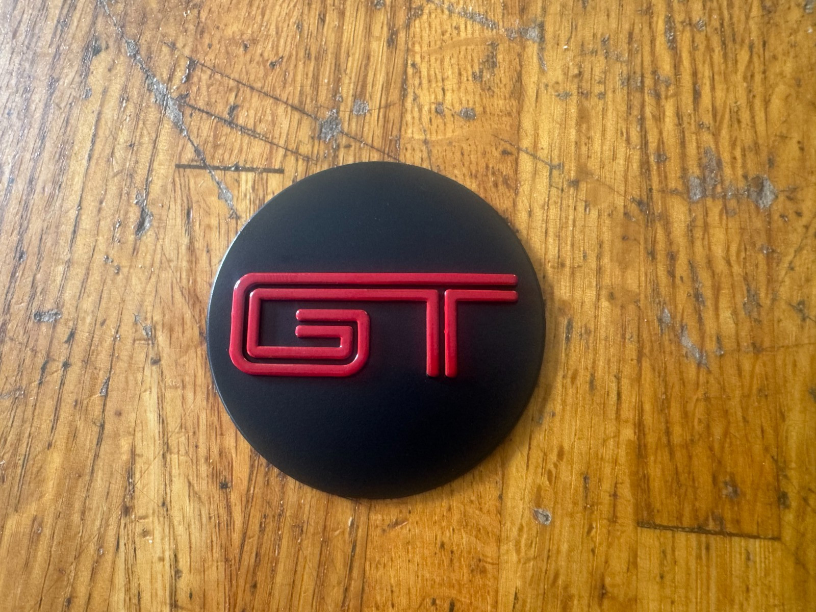2005 2006 2007 08 2009 FORD MUSTANG GT EMBOSSED RED STEERlNG WHEEL EMBLEM  NEW