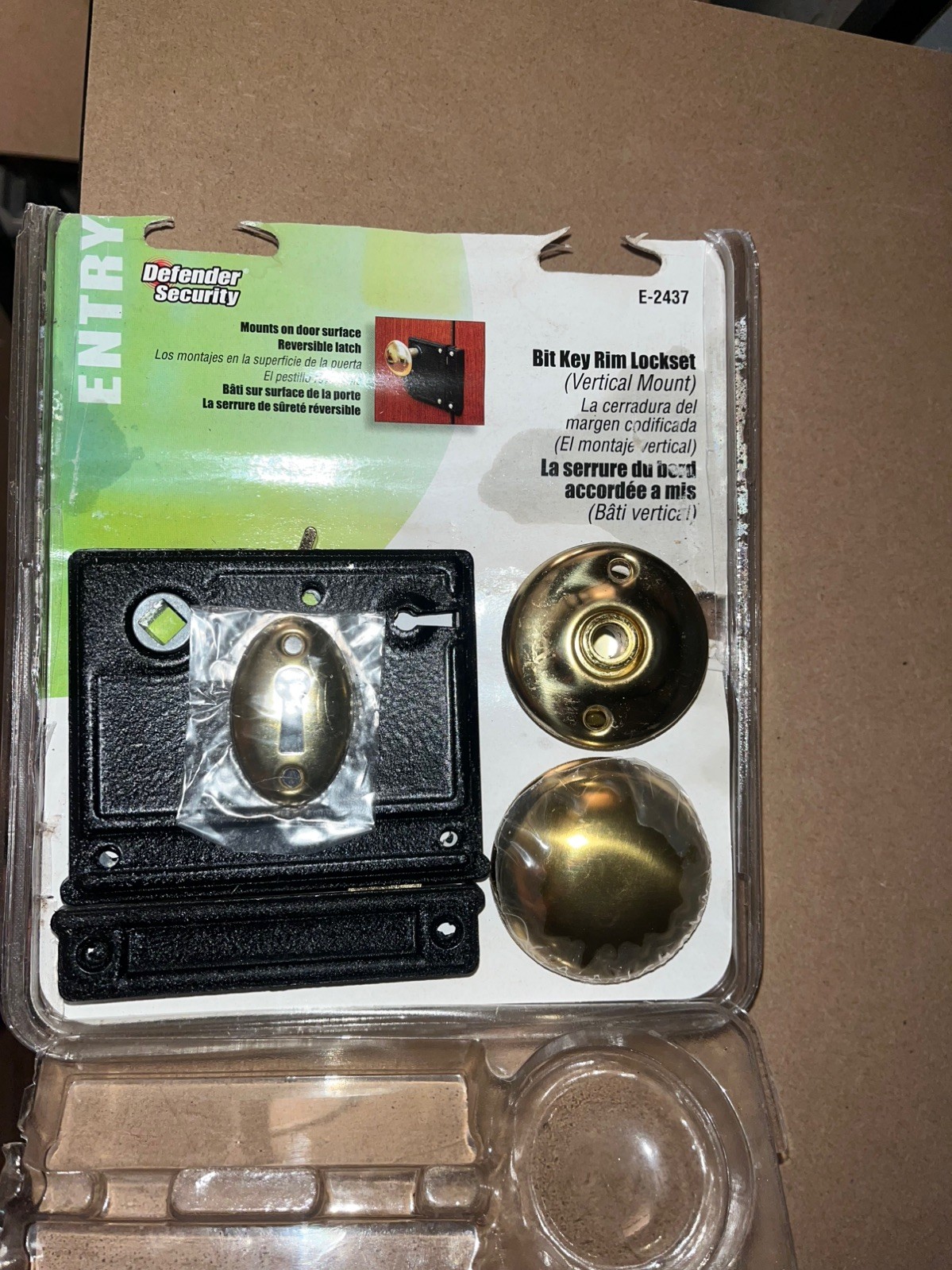 Defender Security Brass/Black Bit Key Rim Lockset, Vertical Style, E-2437