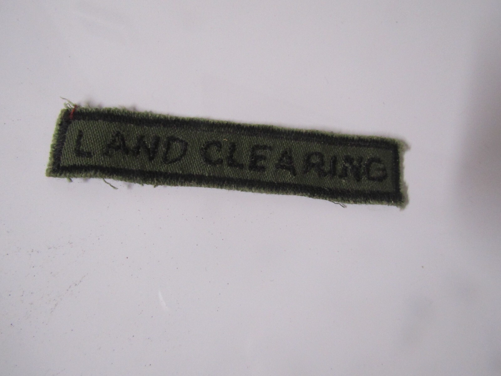 MILITARY PATCH HAND MADE SCROLL TAB LAND CLEARING
