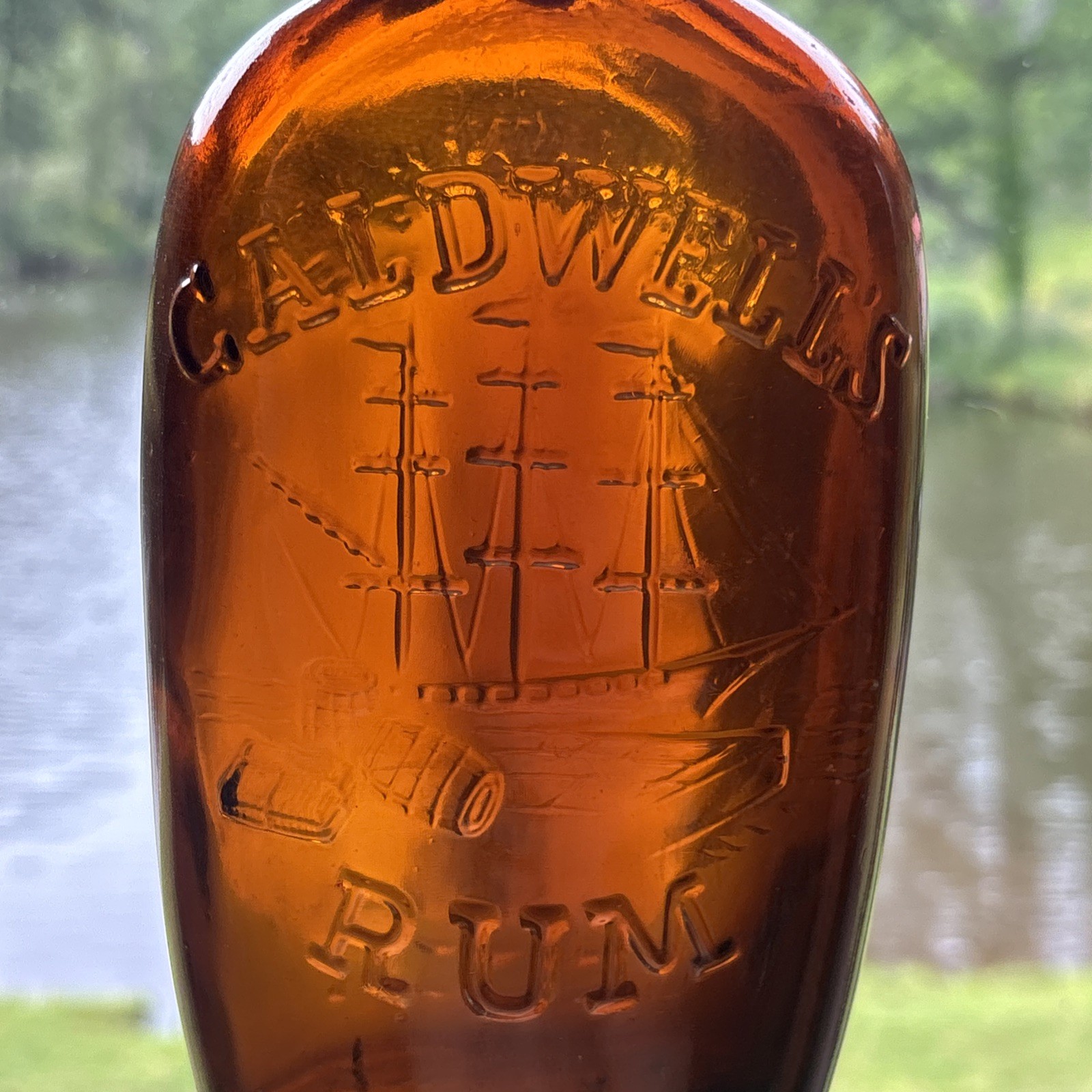 CALDWELL'S  RUM ONE PINT Empty Embossed Clipper Ship Amber Bottle