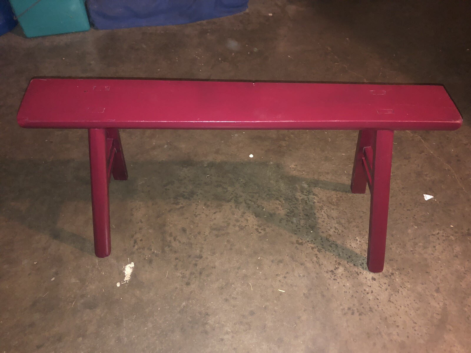 cranberry colored bench